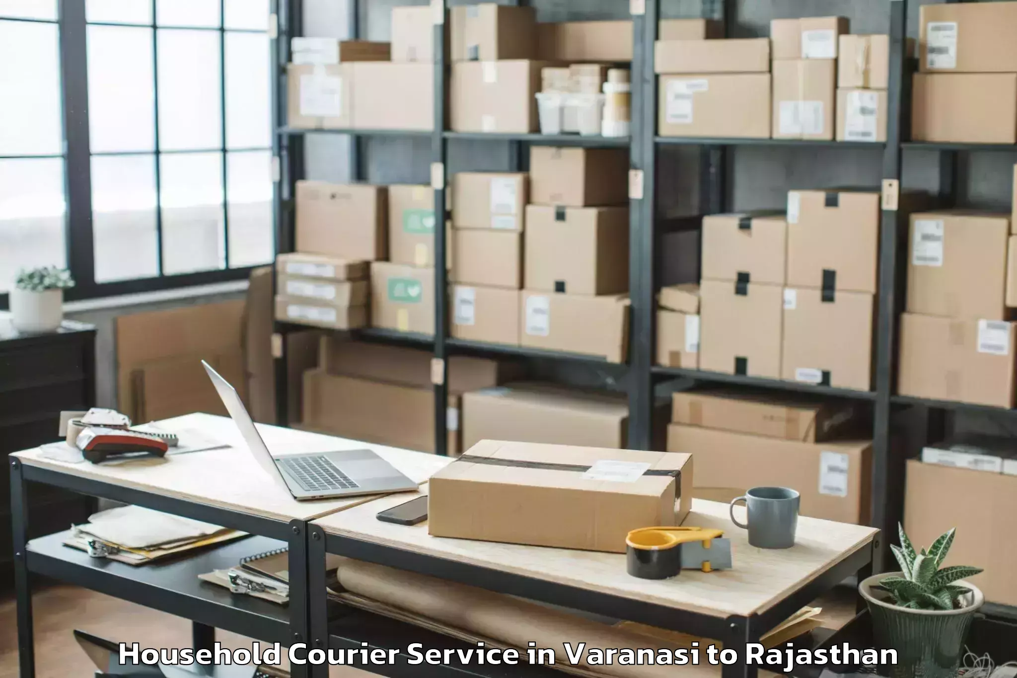 Expert Varanasi to Sadri Household Courier